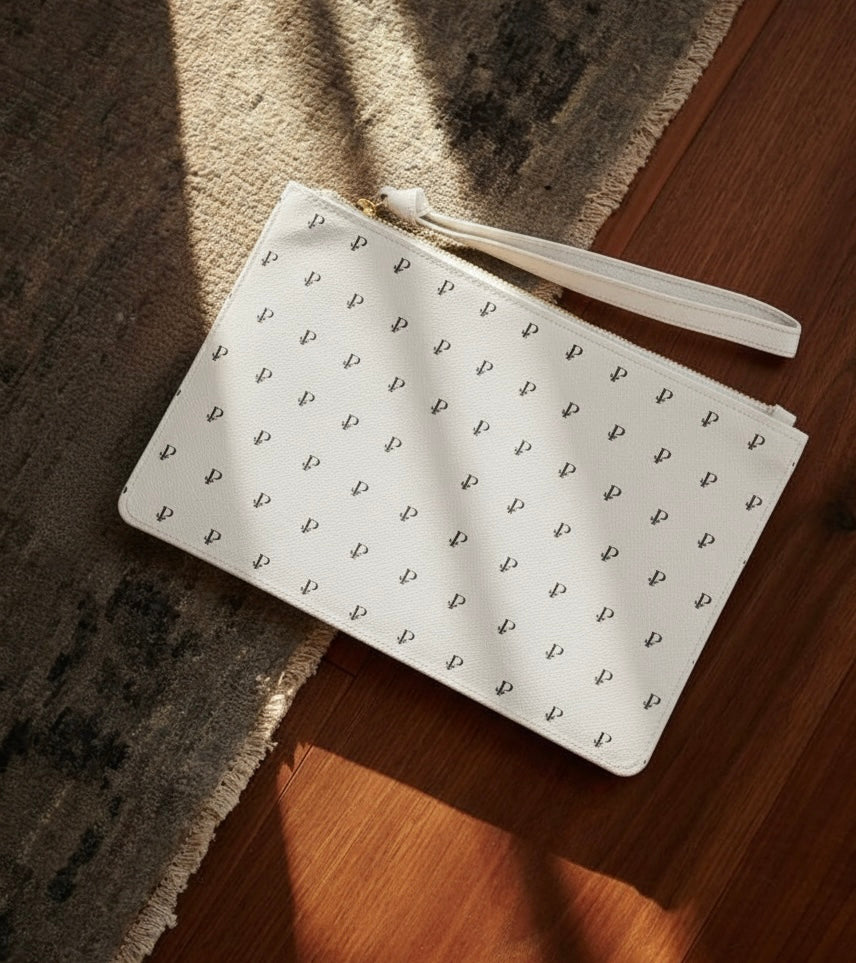 “P Signature — The White Monogram Clutch”